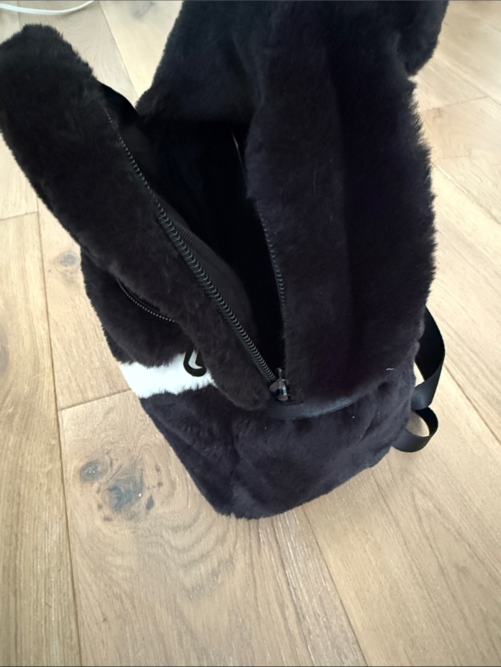 Cozy Black Faux Fur Backpack with White Swoosh - Picture 7 of 9
